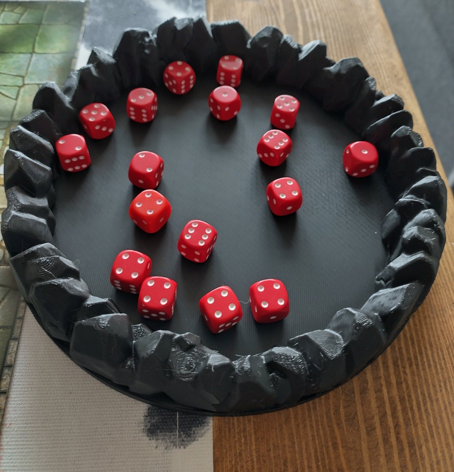 Dice tray decorated with a ring of stones