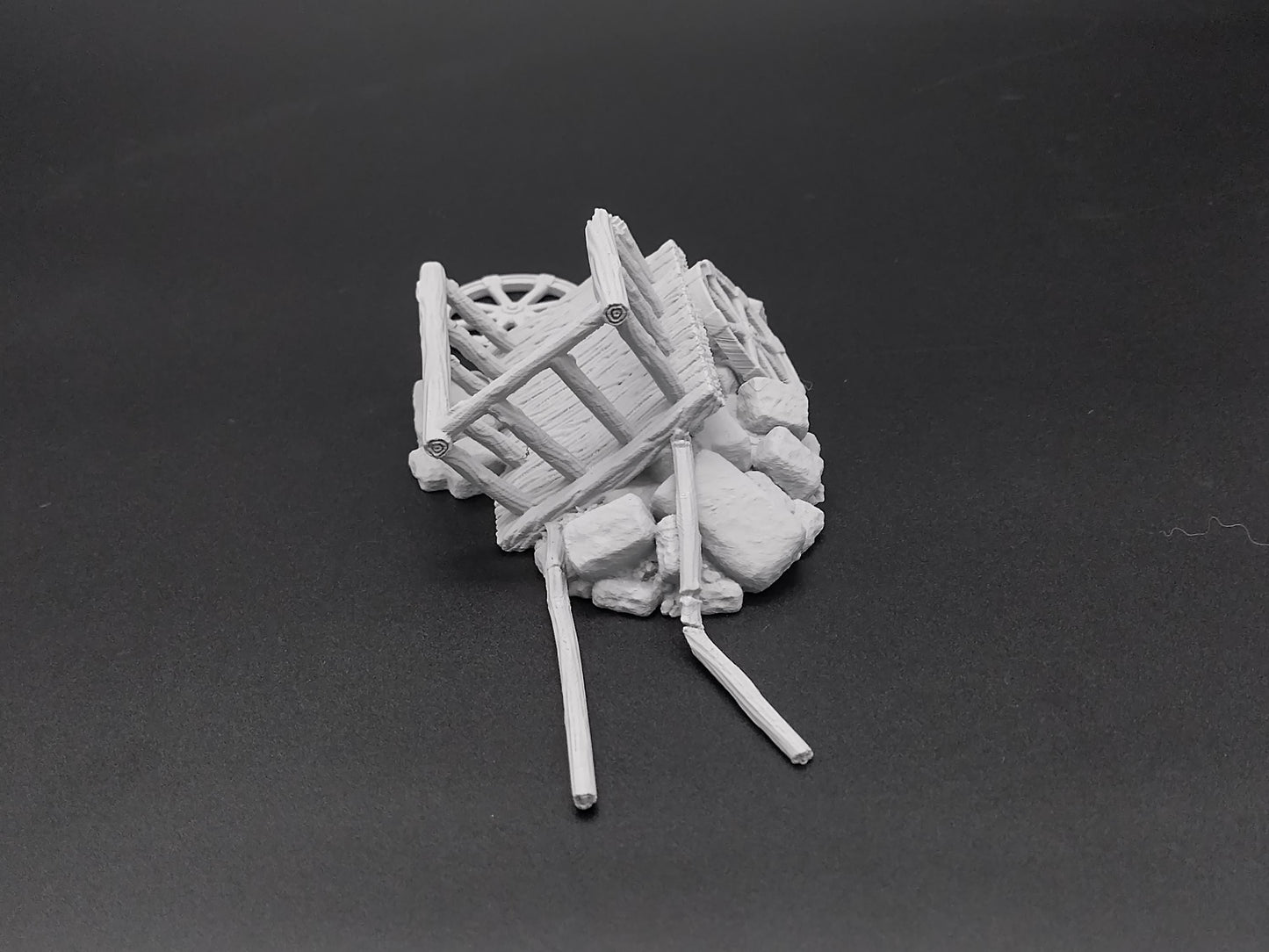 Broken cart on a pile of debris for miniature games 3D printed | 28mm | scatter terrain