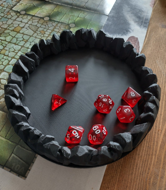 Dice tray decorated with a ring of stones